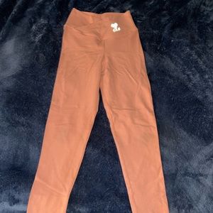 CLS leggings, size XS, color is peachy pink
